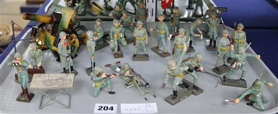 A group of twenty four Lineol composition models of Swiss soldiers,